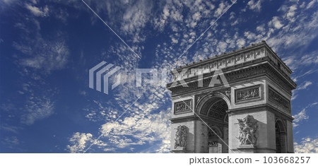 Arc de Triomphe (against the background of sky with clouds), Paris, France. The walls of the arch are engraved with the names of 128 battles and names of 660 French military leaders (in French) Arc de Triomphe (against the background of sky with clouds), Paris, France. The walls of the arch are engraved with the names of 128 battles and names of 660 French military leaders (in French) 103668257