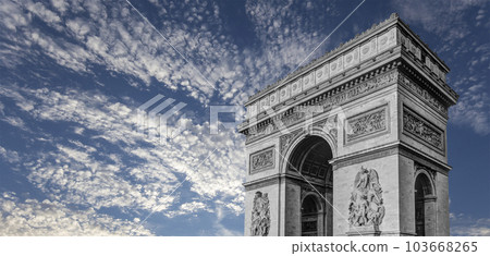 Arc de Triomphe (against the background of sky with clouds), Paris, France. The walls of the arch are engraved with the names of 128 battles and names of 660 French military leaders (in French) Arc de Triomphe (against the background of sky with clouds), Paris, France. The walls of the arch are engraved with the names of 128 battles and names of 660 French military leaders (in French) 103668265