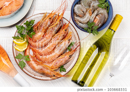 Seafood and Wine on a Table Seafood and Wine on a Table 103668331