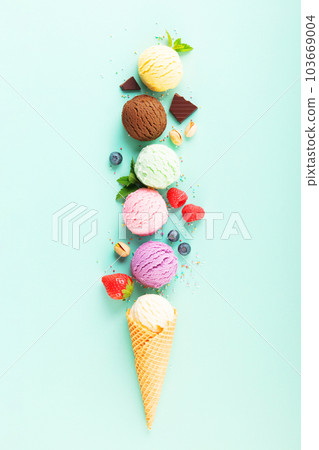 Flying ice cream balls and ingredients on pastel light blue background 103669004