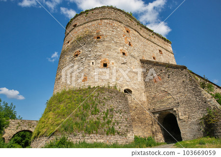 Old stone medieval Stephen Bathory Gate in Kamianets-Podilskyi fortress, Ukraine. 103669059