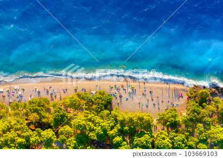 View from the air on the beach. Aerial view. Rest on the beach. Sea relaxation and travel. View from the air on the beach. Aerial view. Rest on the beach. Sea relaxation and travel. 103669103