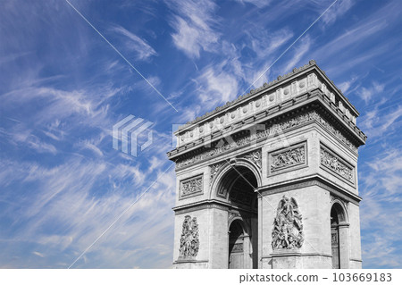 Arc de Triomphe (against the background of sky with clouds), Paris, France. The walls of the arch are engraved with the names of 128 battles and names of 660 French military leaders (in French) Arc de Triomphe (against the background of sky with clouds), Paris, France. The walls of the arch are engraved with the names of 128 battles and names of 660 French military leaders (in French) 103669183