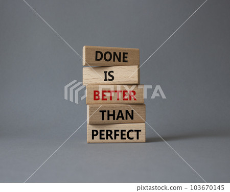 Done is better than Perfect symbol. Wooden blocks with words Done is better than Perfect. Beautiful grey background. Business and Done is better than Perfect concept. Copy space. 103670145