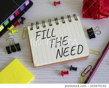 Fill the need symbol. Concept word Fill the need on white notebook. Beautiful wooden background. Business and Fill the need concept. Copy space Fill the need symbol. Concept word Fill the need on white notebook. Beautiful wooden background. Business and Fill the need concept. Copy space 103670192