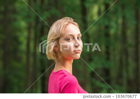 female portrait on a natural background female portrait on a natural background 103670677