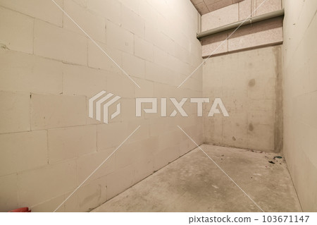 an unfinished room with white walls and no one wall to be used in the space, it is very hard 103671147