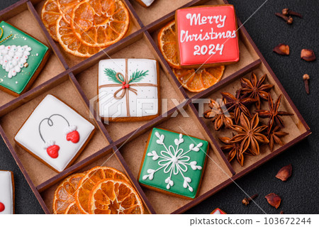 Beautiful colored Christmas gingerbread cookies for the design and decoration 103672244