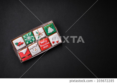 Beautiful colored Christmas gingerbread cookies for the design and decoration Beautiful colored Christmas gingerbread cookies for the design and decoration 103672285