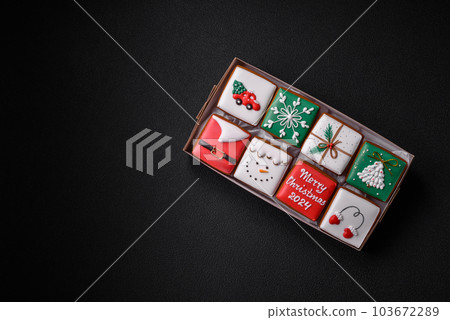 Beautiful colored Christmas gingerbread cookies for the design and decoration 103672289