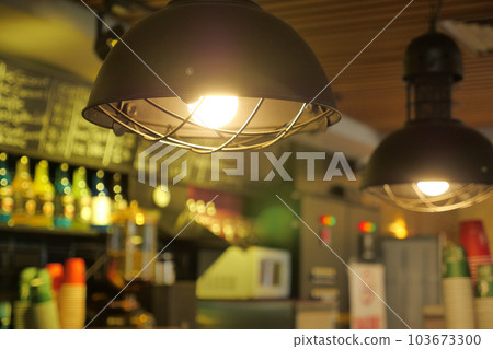 gray ceiling lamp hanging at cafe gray ceiling lamp hanging at cafe 103673300