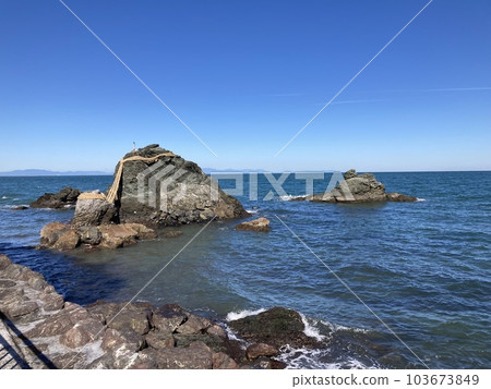 It is a couple rock in the sea of Futami Okitama Shrine, a shrine in Ise City, Mie Prefecture. It is a couple rock in the sea of Futami Okitama Shrine, a shrine in Ise City, Mie Prefecture. 103673849