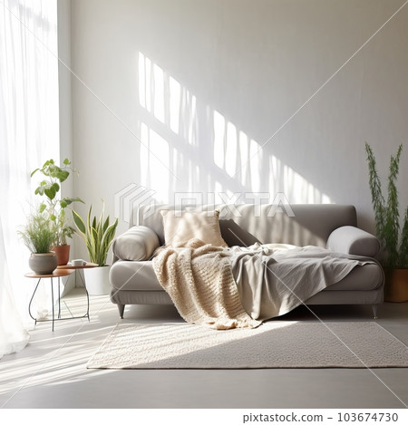 Contemporary home interior with sofa, folded blanket and pillows, detailed room decor, empty wall mockup 103674730