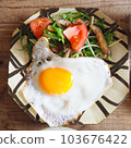 Fried fried egg 103676422
