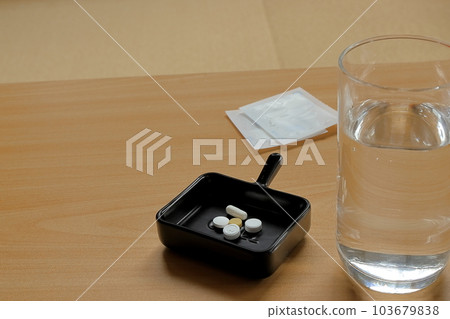 Taking oral medication 103679838