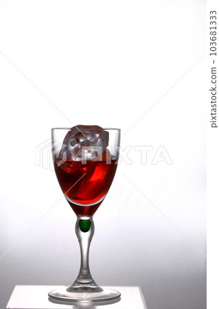 Red wine in glass 103681333