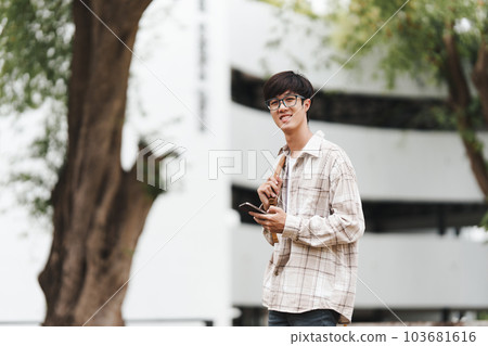Portrait of beautiful student man in university ready for learning. Education, scholarship and happy and proud male learner at university 103681616