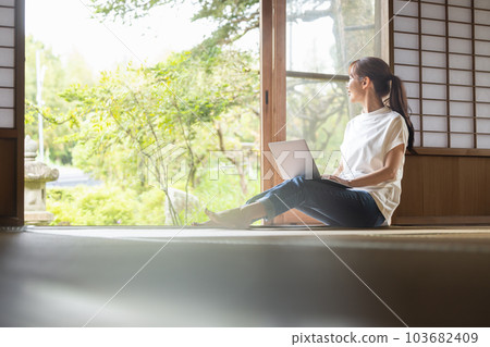 woman enjoying slow life woman enjoying slow life 103682409