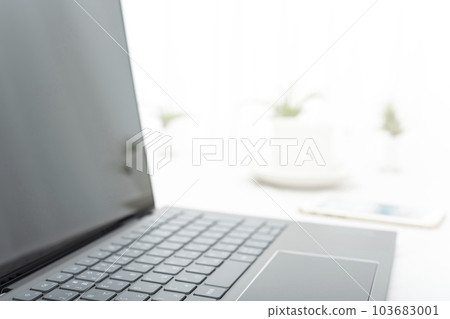 laptop, white table and coffee cup laptop, white table and coffee cup 103683001