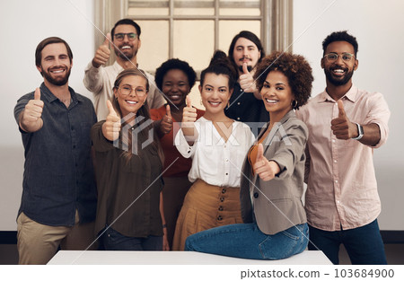 Professional, group and portrait with thumbs up with happiness in the office. Business, people and diversity with thumb like for teamwork with joy at a company for recommending good service. 103684900