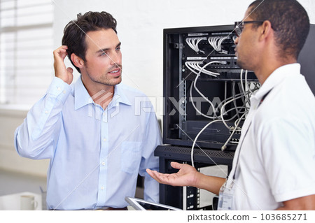 Server room, it support and confused with a technician explaining to a business man about cyber security. Network, database and risk consulting with an engineer talking about information technology 103685271