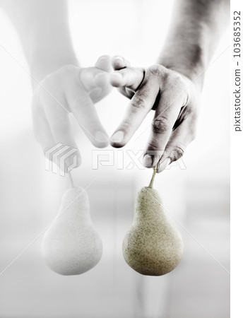 Reflection, art and pear in hands for health, creativity and perception. Creative, healthy and person holding fruit for nutrition, diet and showing food in the mirror for vegan and green lifestyle Reflection, art and pear in hands for health, creativity and perception. Creative, healthy and person holding fruit for nutrition, diet and showing food in the mirror for vegan and green lifestyle 103685352