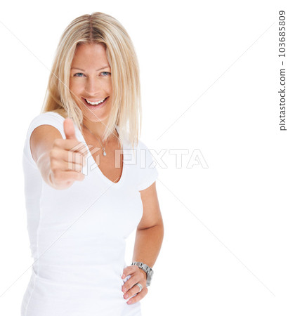 Thumbs up, woman and happy portrait in studio for vote, goal or support. Face of female model isolated on a white background to show hands, sign or emoji icon for like review, feedback or thank you Thumbs up, woman and happy portrait in studio for vote, goal or support. Face of female model isolated on a white background to show hands, sign or emoji icon for like review, feedback or thank you 103685809