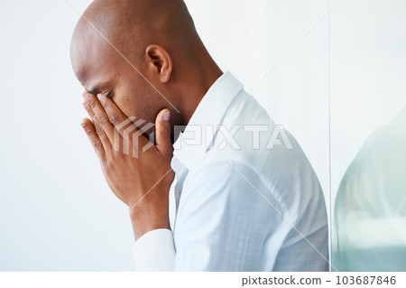 Business, depression and black man crying in office, problem or stress on mockup. Sad, depressed and male professional with fatigue, tired or burnout, anxiety or mental health after fail in workplace 103687846