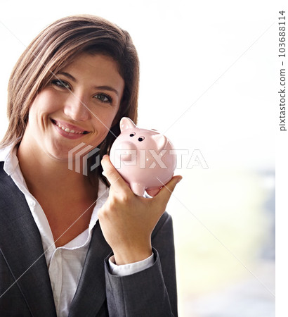 Business woman, piggybank and portrait with smile for savings, money planning and personal finance goal. Female financial advisor, happiness and small start for banking, investment or building wealth 103688114