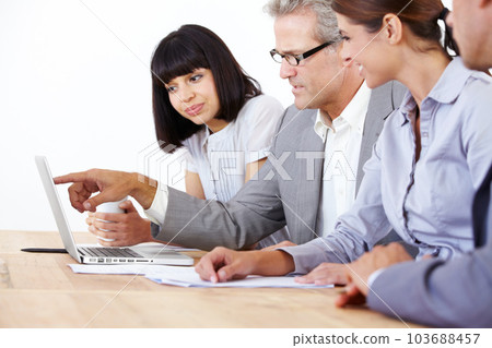 Teamwork, mentor and laptop with business people in office for planning, idea and project management. Training, consulting and technology with ceo and employees for coaching, leadership and meeting Teamwork, mentor and laptop with business people in office for planning, idea and project management. Training, consulting and technology with ceo and employees for coaching, leadership and meeting 103688457