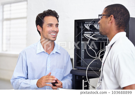 Server room, it support and maintenance with a technician talking to a business man about cyber security. Network, database and consulting with an engineer chatting about information technology 103688899