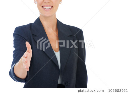 We have a deal. a businesswoman offering her hand out for a handshake. 103688931