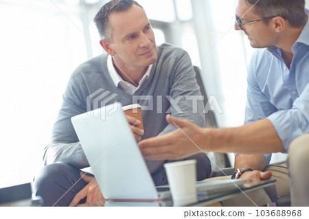 Research, corporate or businessman with laptop for invest strategy, finance growth or financial review. CEO, teamwork or manager in office building planning, data analysis or economy data meeting 103688968