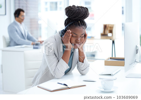 Tired, stress and headache with black woman in call center office for fatigue, anxiety and burnout. Frustrated, mental health and glitch with female employee for communication and customer service Tired, stress and headache with black woman in call center office for fatigue, anxiety and burnout. Frustrated, mental health and glitch with female employee for communication and customer service 103689069