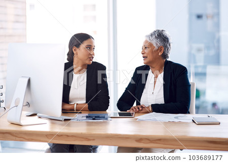 Mentor, collaboration or business women with computer talking, speaking or planning a project in office. Technology, teamwork or senior manager with female intern for strategy training or coaching Mentor, collaboration or business women with computer talking, speaking or planning a project in office. Technology, teamwork or senior manager with female intern for strategy training or coaching 103689177