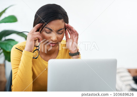 Stress, headache and business woman on computer thinking of mistake, health problem or work from home burnout. Depressed, anxiety and fatigue or migraine pain of african person or designer on laptop 103689626