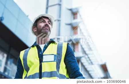 Engineering, building and architecture with man in city for planning, designer or industry. Architecture, project management or infrastructure with male contractor on construction site for inspection 103690046