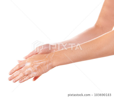 She has good hygiene habits. a woman washing her hands. She has good hygiene habits. a woman washing her hands. 103690183