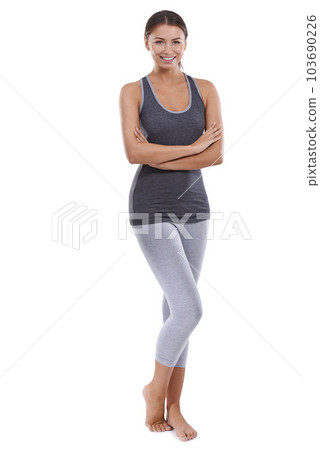 Confident about staying healthy. Portrait of a beautiful young woman standing with her arms folded. 103690226