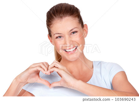 Love, care and portrait of woman doing heart sign, shape or gesture with hands isolated on a white studio background. Happy, casual and female person with happiness, care and kindness signal 103690243