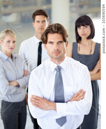 Portrait, confident people with serious face and arms crossed in business office. Teamwork or collaboration, coworkers or colleagues in corporate environment and professional leadership or management Portrait, confident people with serious face and arms crossed in business office. Teamwork or collaboration, coworkers or colleagues in corporate environment and professional leadership or management 103690594