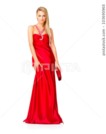 Young and elegant woman in a red dress or fancy gown while feeling confident and beautiful against a copy space background. Lady wearing designer clothes and accessories for prom, bridesmaid or event 103690968