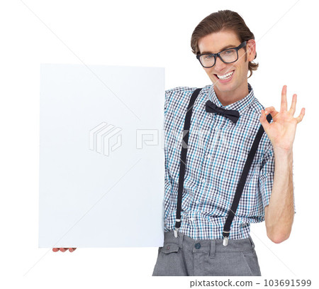 Ok sign, portrait and man with poster for mockup in studio isolated on a white background. Board, okay hand gesture and male person, geek or nerd with smile for copy space, advertising and glasses. Ok sign, portrait and man with poster for mockup in studio isolated on a white background. Board, okay hand gesture and male person, geek or nerd with smile for copy space, advertising and glasses. 103691599