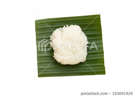 Sticky rice on banana on white background. 103691920