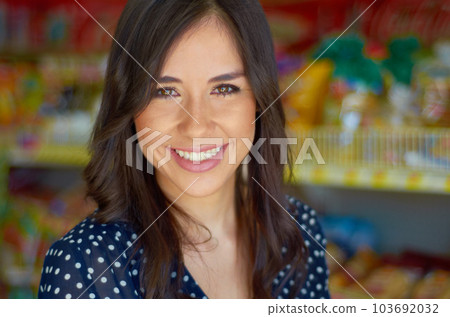 Young woman, portrait and smile in grocery store for shopping, discount and sale for customer experience. Shop owner, small business and female entrepreneur in supermarket with pride, happy and goals Young woman, portrait and smile in grocery store for shopping, discount and sale for customer experience. Shop owner, small business and female entrepreneur in supermarket with pride, happy and goals 103692032