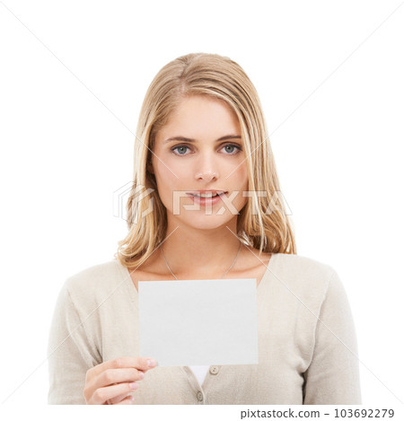 What do you think of this. Studio shot of an attractive young woman holding a blank card in front of her isolated on white. 103692279