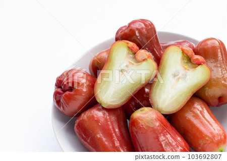 Fresh rose apple on white background. Fresh rose apple on white background. 103692807