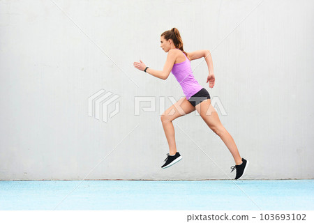 Woman, fitness and running on mockup for workout, cardio training or healthy exercise outdoors. Fit, active and sporty female person or runner exercising for health and wellness on wall mock up space 103693102