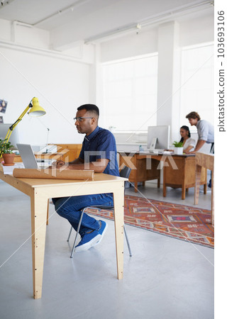 Civil engineering, blueprint or black man typing on laptop working on architect project, planning or online research. Digital, designer or focused African civil engineer with floor plan on website Civil engineering, blueprint or black man typing on laptop working on architect project, planning or online research. Digital, designer or focused African civil engineer with floor plan on website 103693106