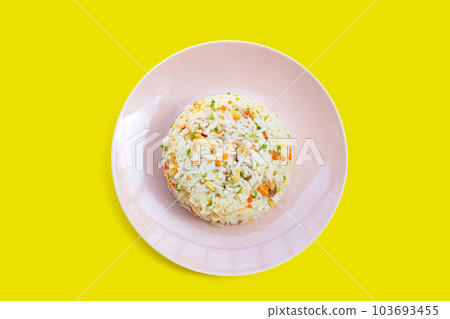 Fried rice in plate on yellow background. 103693455